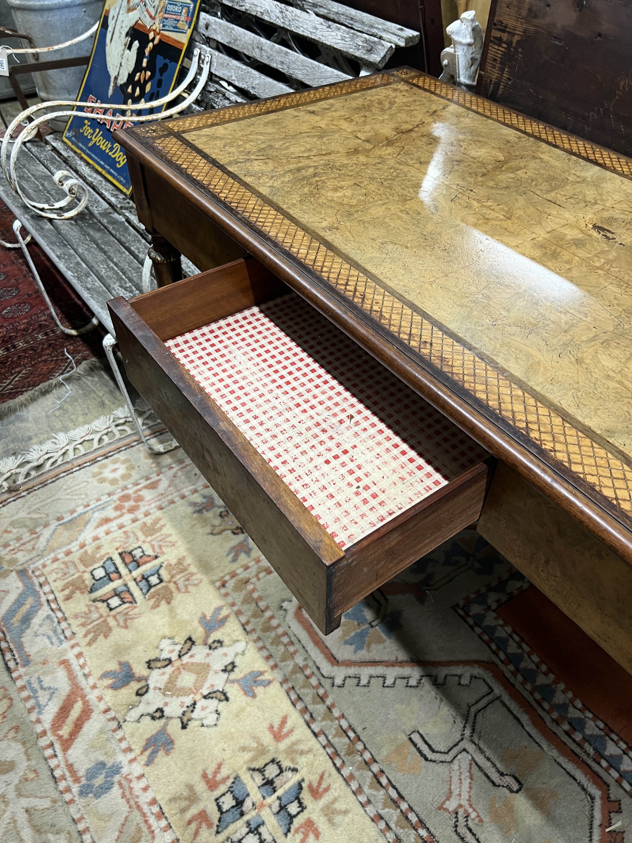 A good quality French Empire style writing table, width 121cm, depth 62cm, height 75cm